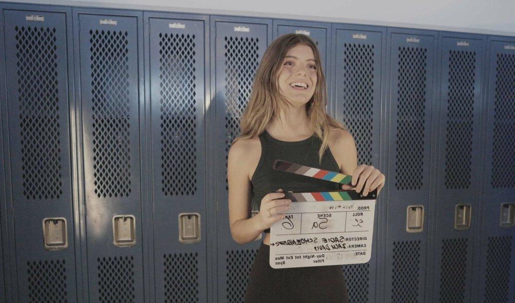 Sadie Schoenberger '25 on set in locker room